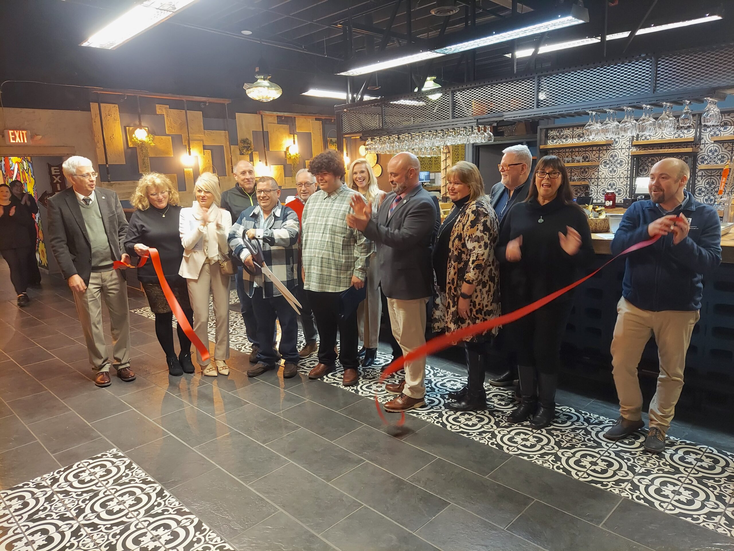 Totopos holds ribbon cutting | News, Sports, Jobs - Observer Today